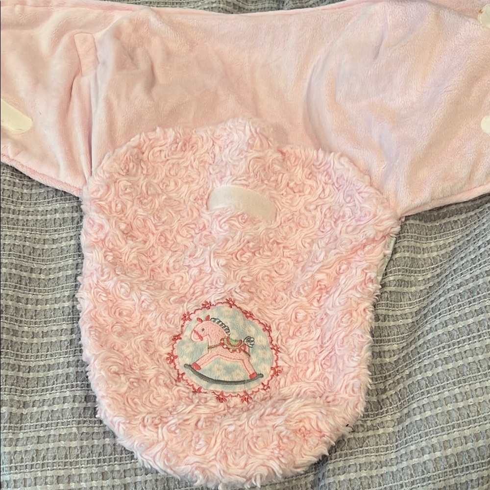 Pink Fuzzy Baby Swaddle with Embroidered Carousel
